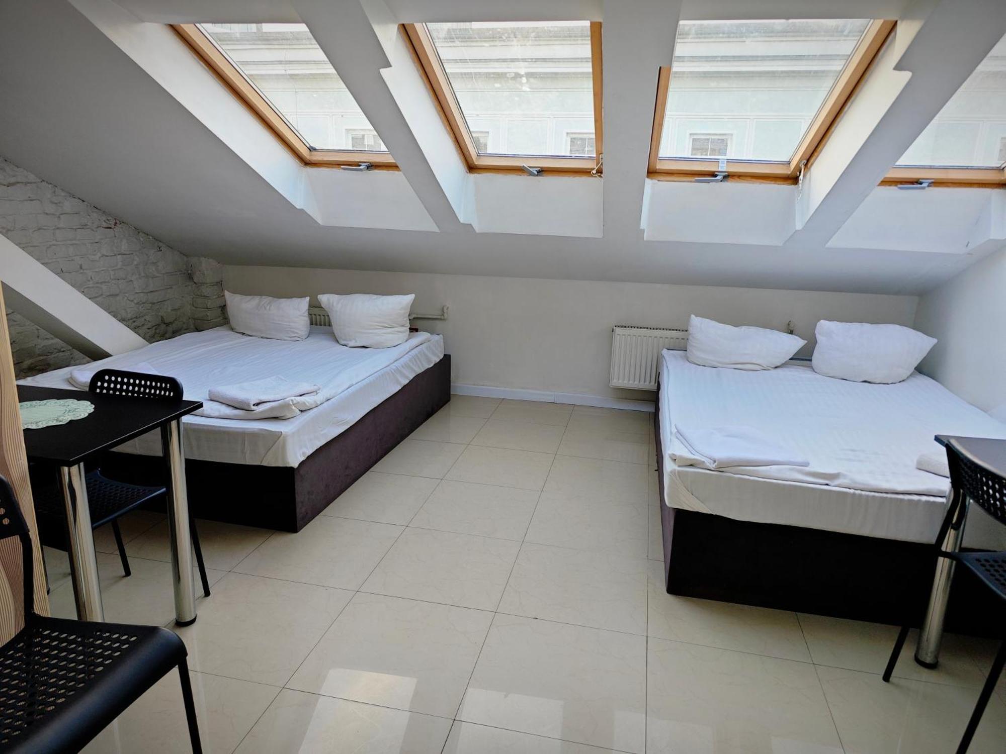 Apartamenty Hoza Attic Studio Варшава Стая снимка
